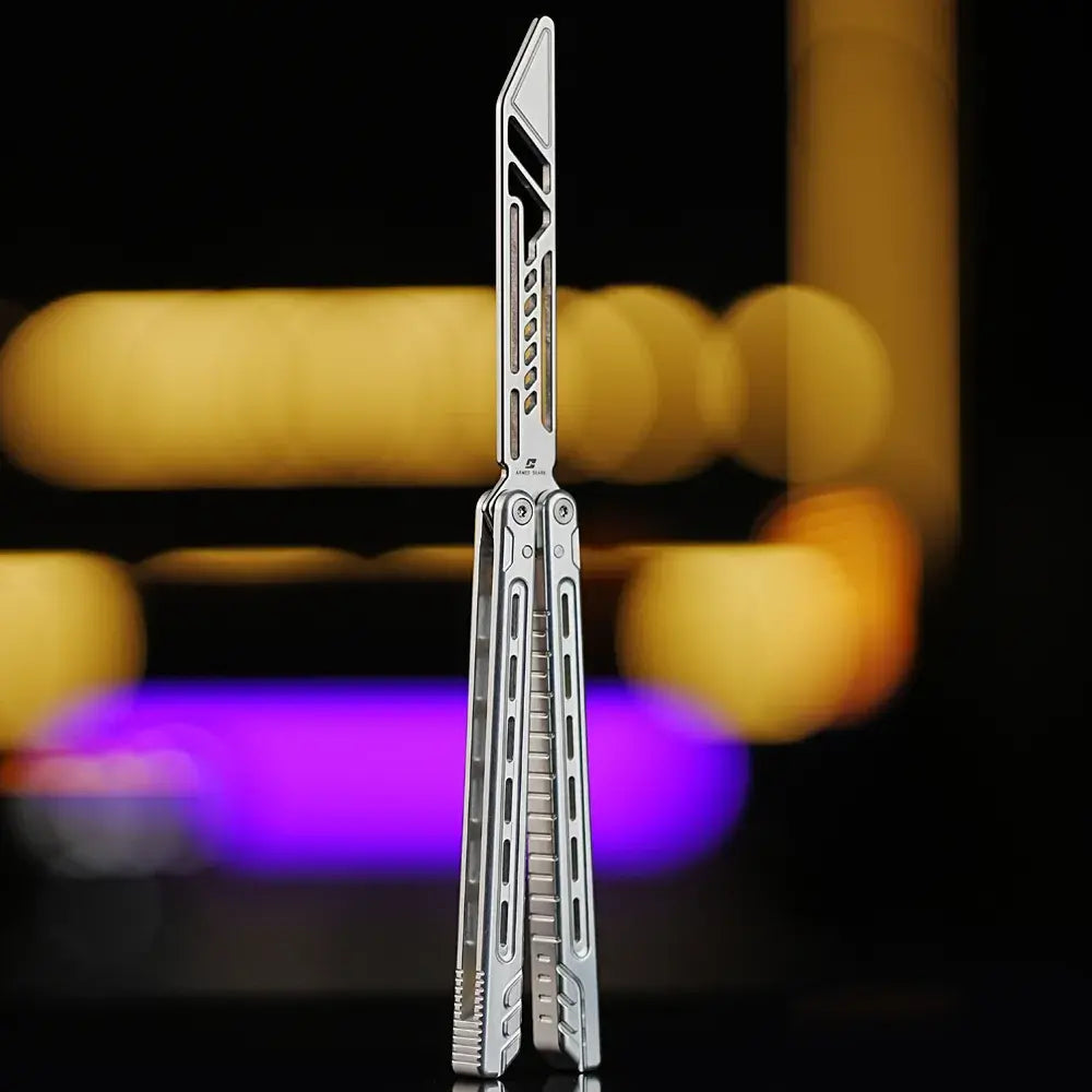 Armed Shark Athena Balisong Trainer in mirror-polished silver finish, fully open position with CNC-machined handle and luminous studio background