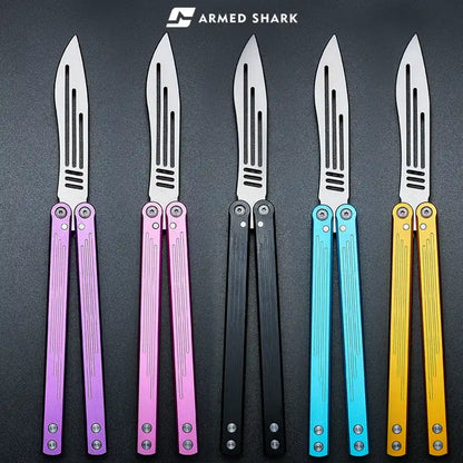 Armed Shark Balisong Trainer set in purple, pink, black, blue, and gold handles – group lineup view.