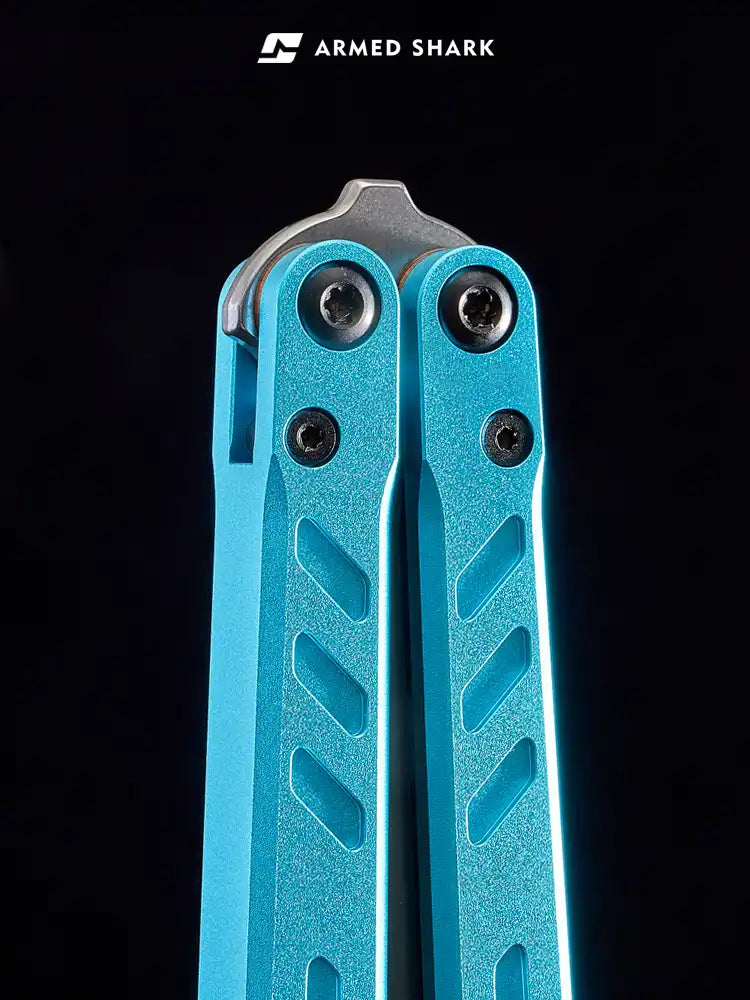 Close-up of Armed Shark BB 7075 balisong trainer blue aluminum handle with pivot screws.