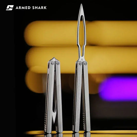 Armed Shark CK-SR balisong trainer in open and closed view with silver titanium handles