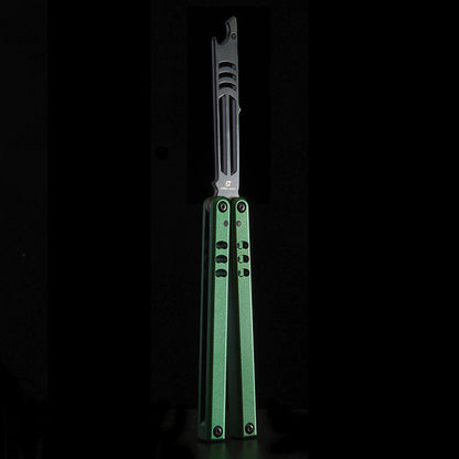Armed Shark Inked Mako bottle-opener balisong trainer with black training edge and green anodized handles, front view on black background.
