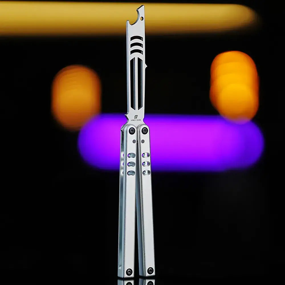 Front view of the Armed Shark Inked Mako balisong trainer featuring a bottle-opener head and silvery handles with slot milling.