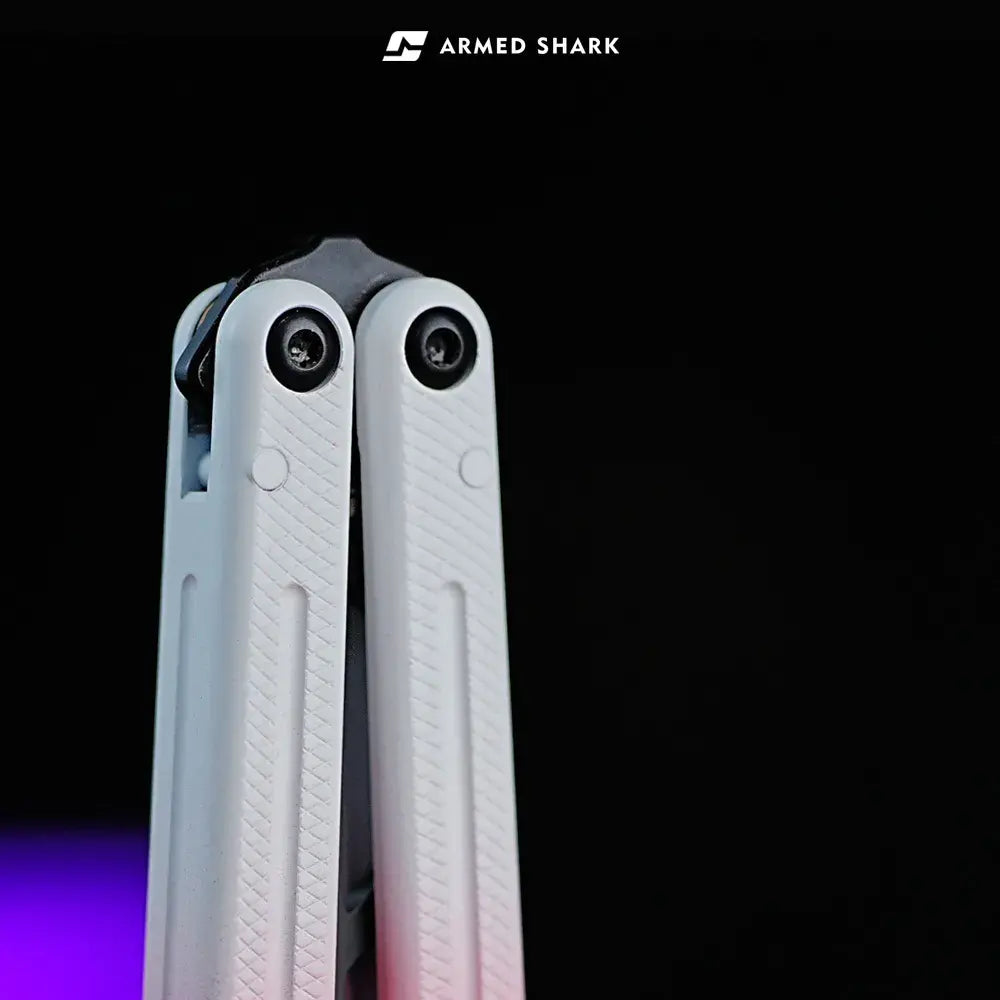 Armed Shark Krake Raken v3 Ceramic Balisong Trainer – white handle with pivot system close-up