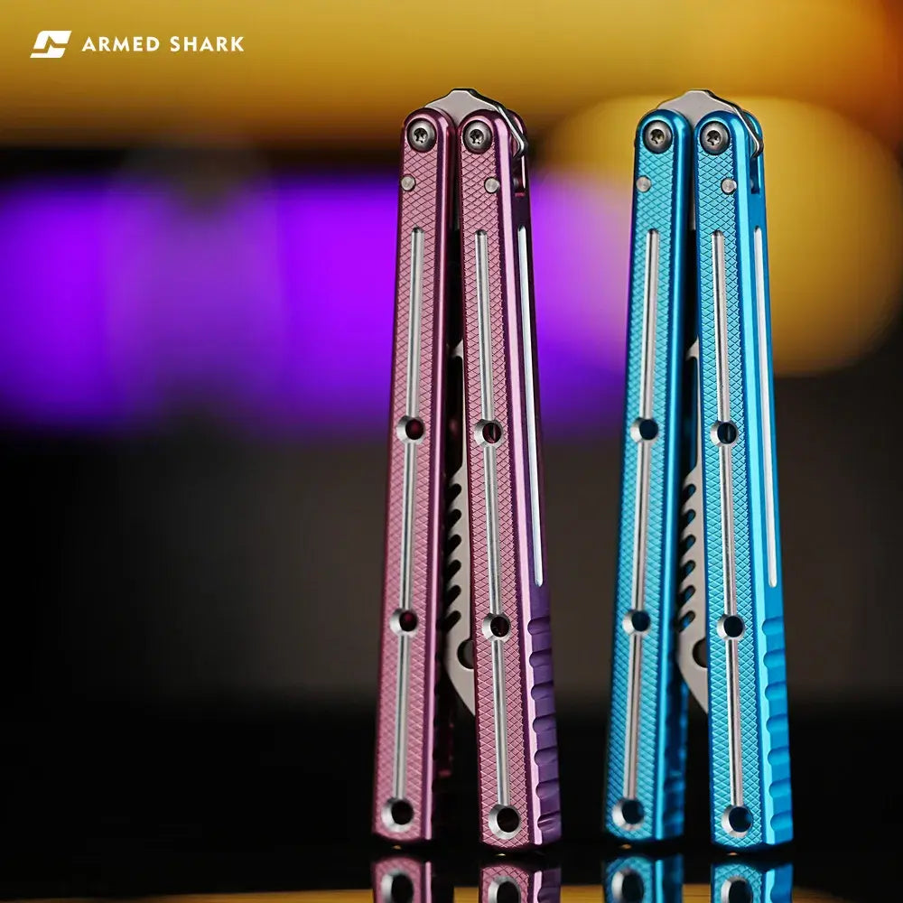 Armed Shark Krake Raken v3 balisong trainer Slot Red and Slot Blue side by side