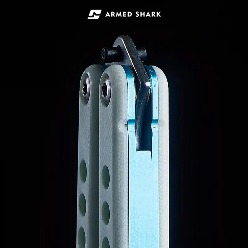 Armed Shark Nautilus v2 Balisong Trainer handle pivot system with screws close-up