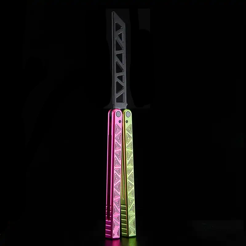 Armed Shark Original Balisong Trainer with pink and green anodized handles, black trainer blade.