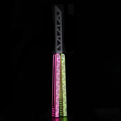 Armed Shark Original Balisong Trainer with pink and green anodized handles, black trainer blade.