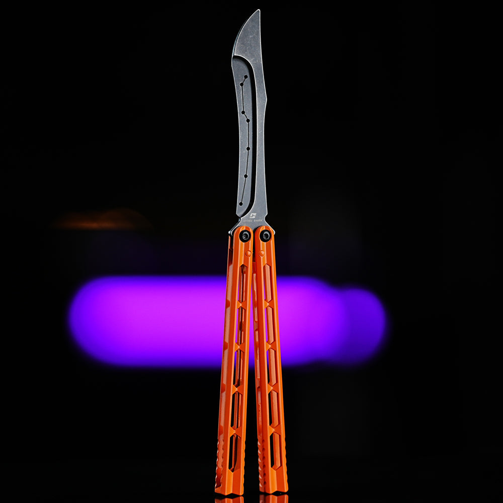 Armed Shark Prism Balisong Trainer front view in orange handles featuring stonewash finish and balanced symmetry