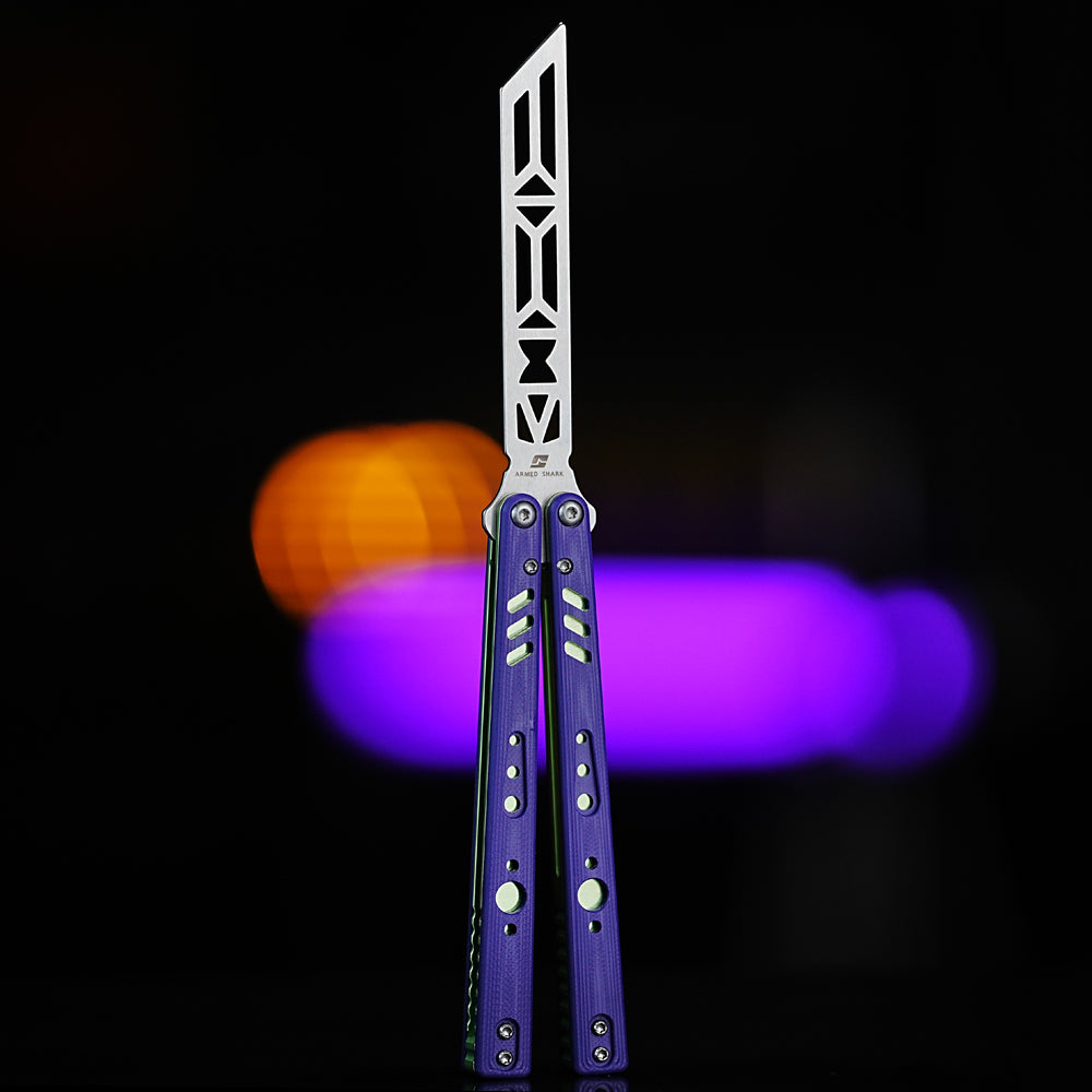 Armed Shark REP V2 Butterfly Trainer with blue and green G10 handles shown in front view under studio lighting