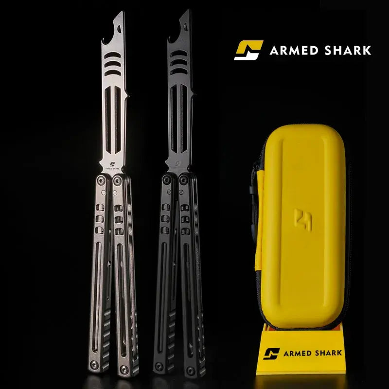 Armed Shark Titanium Inked Mako Bottle Opener Balisong Trainer displayed with yellow storage case under studio lighting