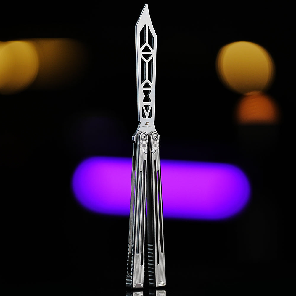 Front view of Armed Shark Titanium Alloy REP/SE Special Edition trainer showing full-body design with geometric cutouts and blurred purple background